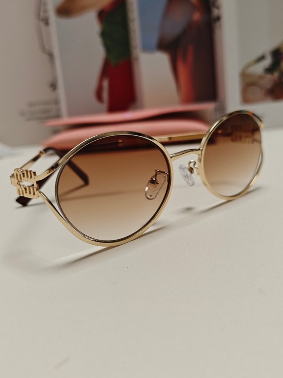 MIUMIU Miu Miu retro oval sunglasses fashion UV sunshade Korean glasses high quality tide