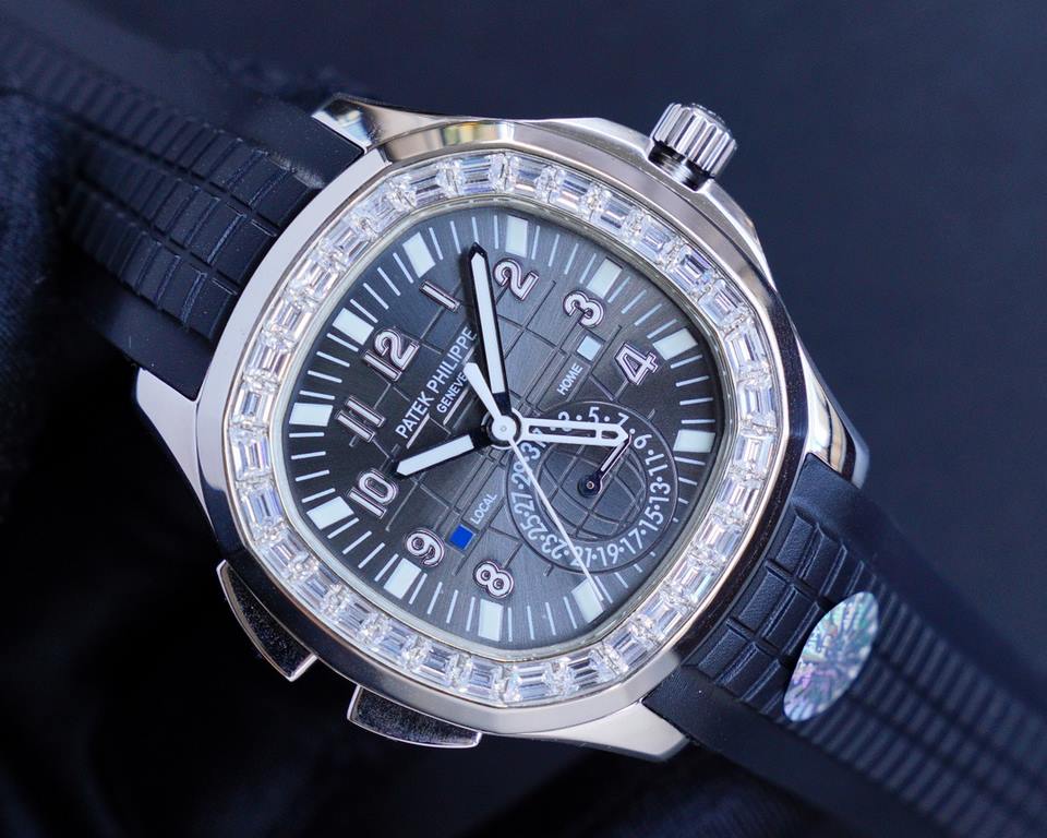 The Patek Philippe AQUANAUT collection is proud to present the first casual-style Dual Time watch - model 5164! With two hour hands (indicating local time and time of origin), a daynight display and a pointer date, the s