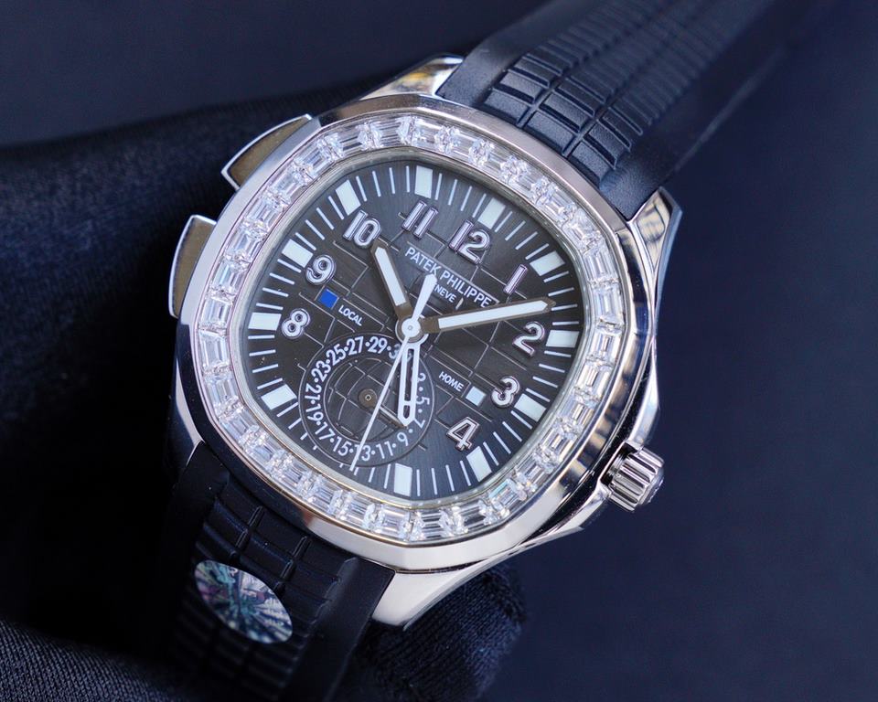 The Patek Philippe AQUANAUT collection is proud to present the first casual-style Dual Time watch - model 5164! With two hour hands (indicating local time and time of origin), a daynight display and a pointer date, the s