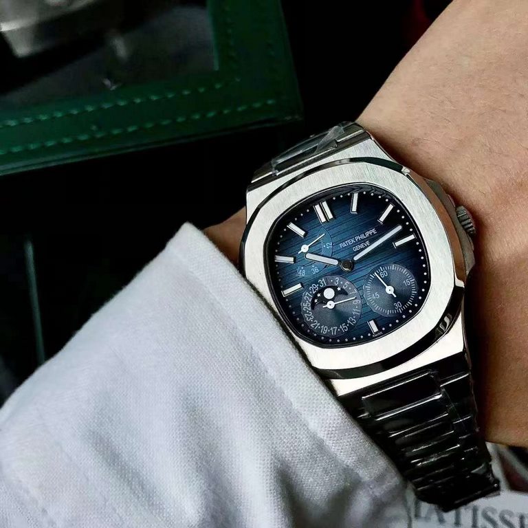 Patek Philippe Nautilus 5712A Arrival The world's most expensive porthole, this porthole-inspired bezel is not round or square, but rather an octagon with curved corners; the shoulder hinges protruding from the left and 