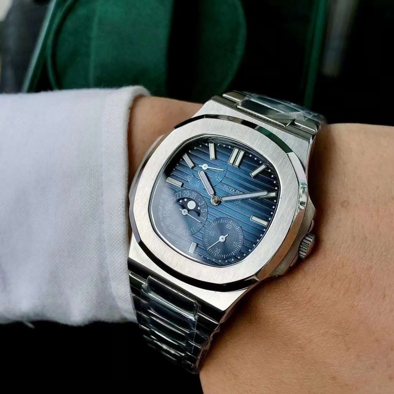 Patek Philippe Nautilus 5712A Arrival The world's most expensive porthole, this porthole-inspired bezel is not round or square, but rather an octagon with curved corners; the shoulder hinges protruding from the left and 