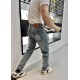 LOEWELOEWE Embroidered Bird and Flower Logo Jeans at the Back Top #