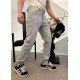 Louis Vutton Louis Vuitton jeans with cartoon character embroidered logo on the back Top Result#