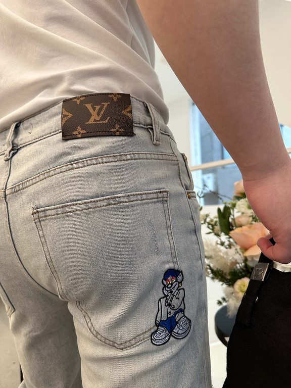 Louis Vutton Louis Vuitton jeans with cartoon character embroidered logo on the back Top Result#