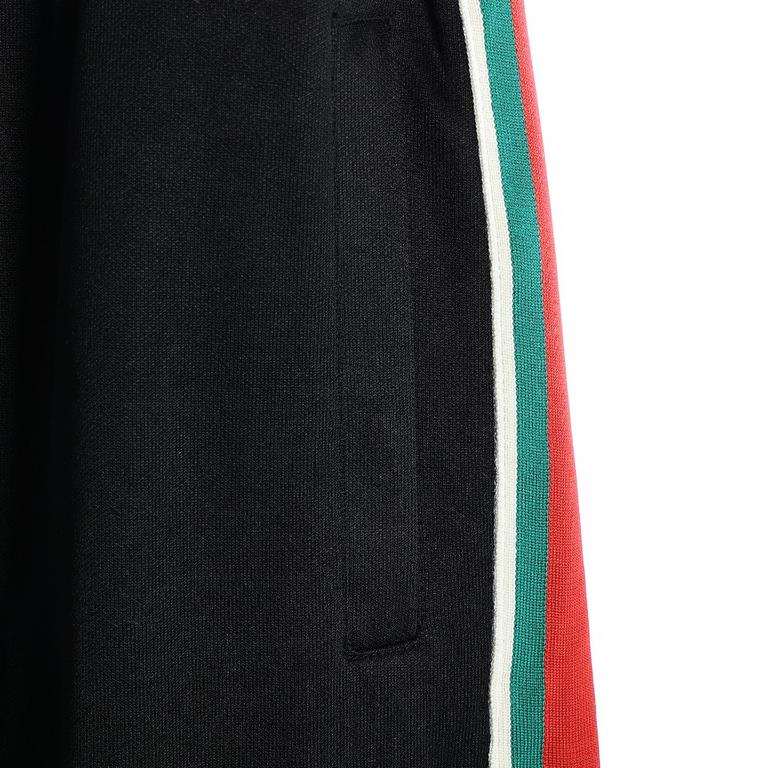 GucciGucci Classic Red and Green Webbing Set TrousersOriginally purchased for 8,500, polyester fabric, clashing stripes on both sides of the pants, interlocking double G giclée print, drawstring elasticized waistband, st