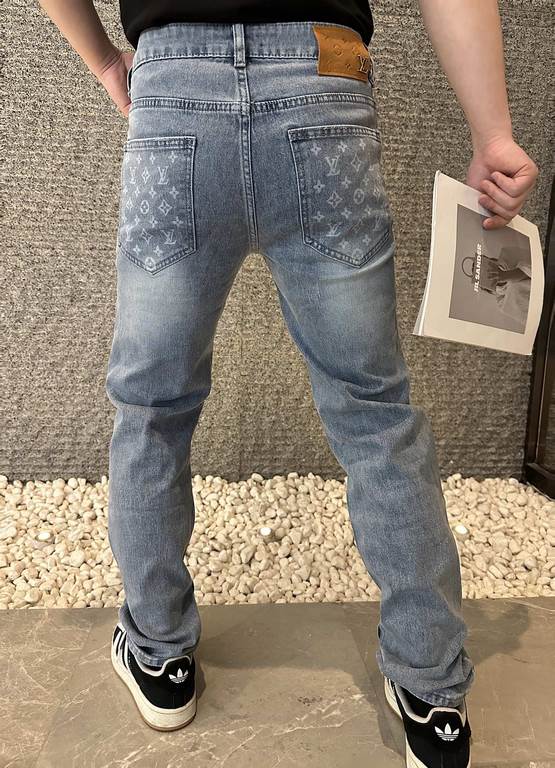 LOUIS VUITTONLouis Vuitton LV jeans with logo printed on the back pockets...