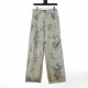 Balenciaga Balenciaga BLCG 23FW Runway White Graffiti Denim TrousersCustom woven and dyed 13.5 ounce fabric, Baggy fit, hand-painted graffiti print all over, hand airbrushed distressing on the leg opening, positional fra