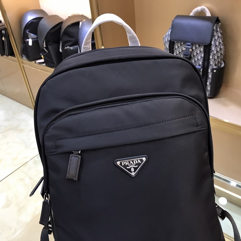 PRADA Prada  New shoulder bag, original  This backpack is outlined in imported Saffiano leather trim, presenting a modern sense of minimalist lines, made of a combination of imported nylon fabric and cross-grain cowhide 