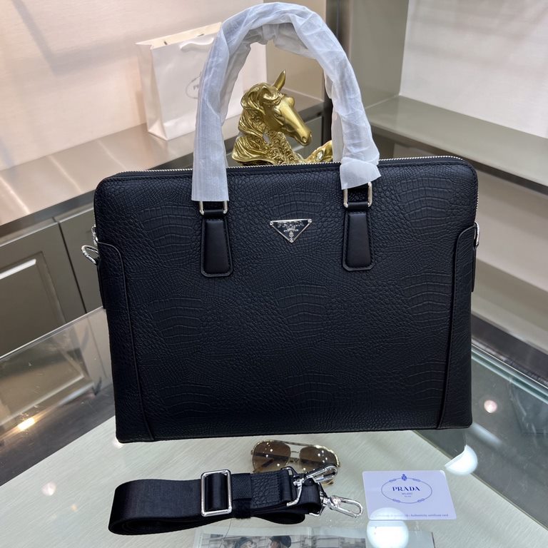 PRADA Prada New Briefcase Made of imported cowhide leather, top polished stainless steel finish metal accessories , front exterior triangular enamel logo, double zipper design, simple and generous business Successful men