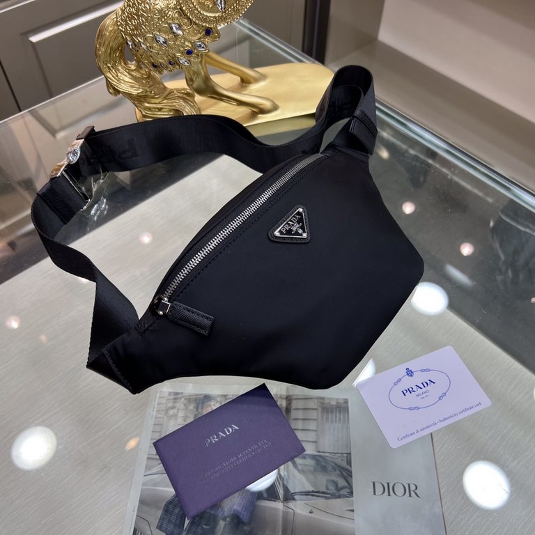 PRADA Prada  WaistChest Pack 2VL033  This fanny pack is crafted from Saffiano leather and Re-Nylon recycled nylon. The contemporary design borrows from streetwear style. Featuring an adjustable nylon waist belt, the bag 