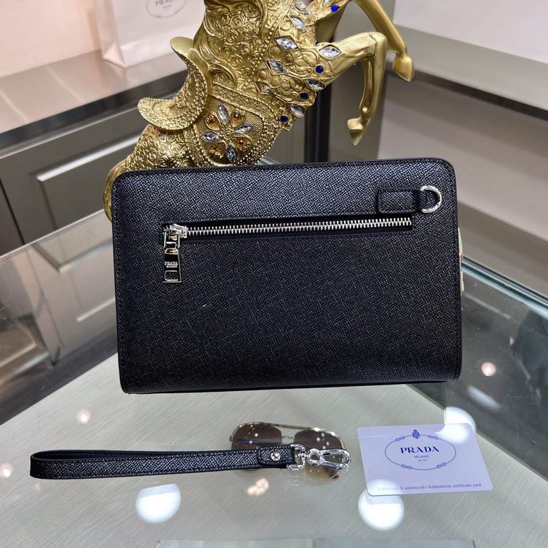 PRADA Prada New Clutch Bag Made of imported cowhide leather, top polished stainless steel finish metal fittings , front exterior triangular enamel logo, ring head with combination lock, simple and generous business Succe