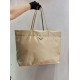 New Tote Bag 1BG107  This medium tote bag is crafted from innovative recycled nylon fabric for a minimalist and stylish design. Featuring a beautiful Saffiano leather carry handle, the bag is adorned with the iconic enam