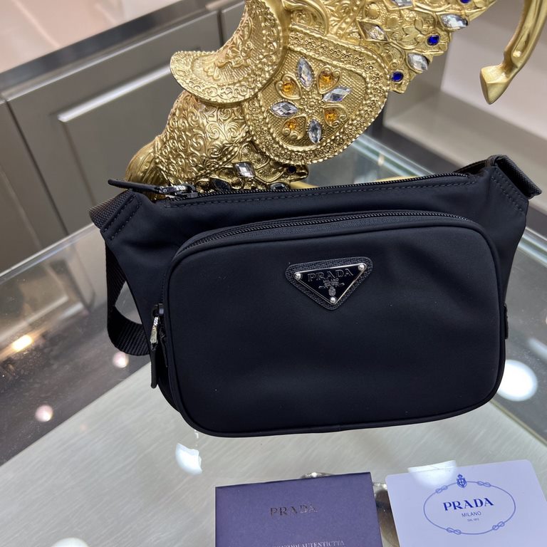 PRADA Prada New Belt Bag 2VH128   The summer collection combines technologically innovative fabrics with traditional materials. Clothing and accessories reveal innovative silhouettes that celebrate contradictory and oppo