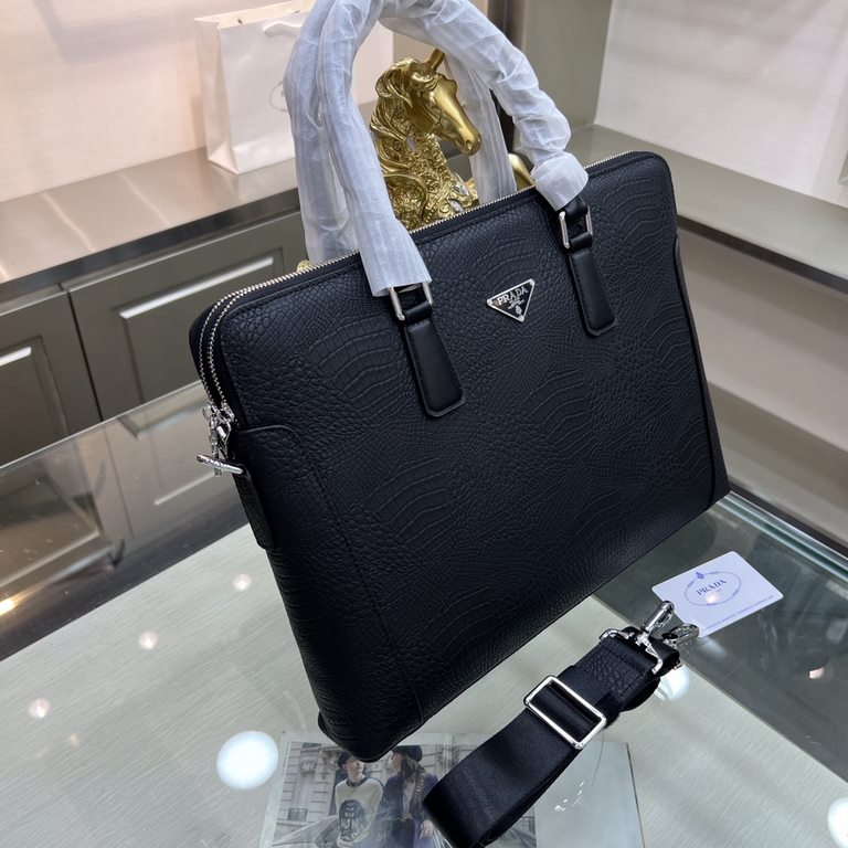 PRADA Prada New Briefcase Made of imported cowhide leather, top polished stainless steel finish metal accessories , front exterior triangular enamel logo, double zipper design, simple and generous business Successful men