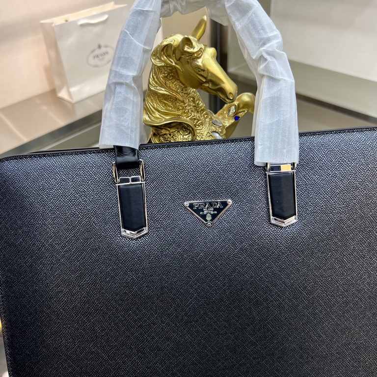 PRADA Prada New Briefcase Made of imported cowhide leather, top polished stainless steel finish metal accessories , front exterior triangular enamel logo, ring head with combination lock, simple and generous business Suc