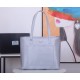 Lot   Tote Bag  1BG052    This nylon tote bag combines fashionable design and functionality with long Saffiano leather handles for a personalized touch, a two-way top zipper closure, a front exterior pocket, and two inte