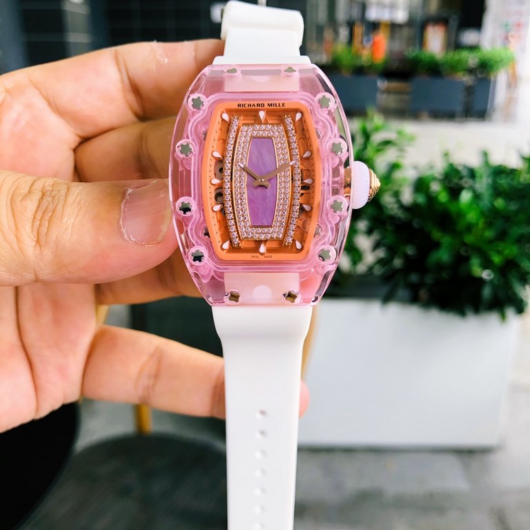 Richard Mille  RichardMille RM 07-02Tonneau-shaped Xin case is made from a whole piece of pink by Plexiglas,  with original Citizen fully automatic movement, top oak strap. The dimensions are 46mm x 32mm x 14mm.  The cas