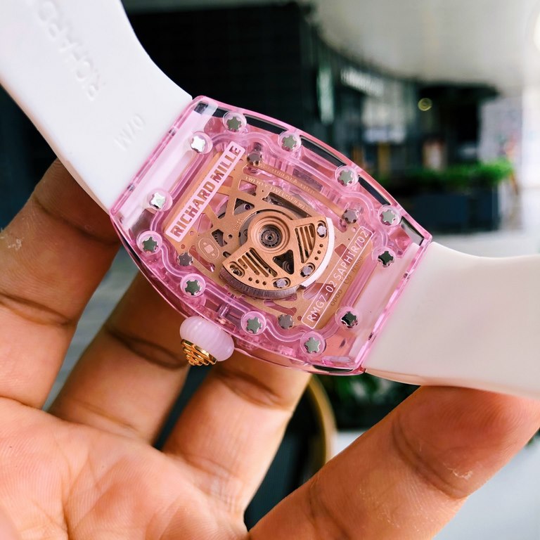 Richard Mille  RichardMille RM 07-02Tonneau-shaped Xin case is made from a whole piece of pink by Plexiglas,  with original Citizen fully automatic movement, top oak strap. The dimensions are 46mm x 32mm x 14mm.  The cas