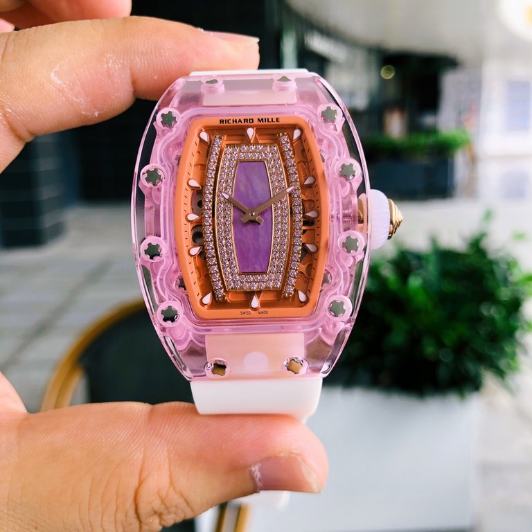 Richard Mille  RichardMille RM 07-02Tonneau-shaped Xin case is made from a whole piece of pink by Plexiglas,  with original Citizen fully automatic movement, top oak strap. The dimensions are 46mm x 32mm x 14mm.  The cas