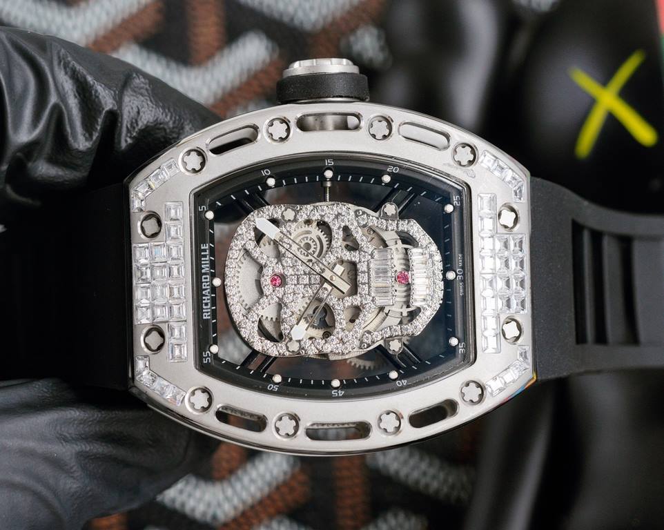 Richard Mille RM-052 The newest addition to the RM-052 collection, the skull and skeleton collection, with its diamond-encrusted case and original mechanical movement, highlights the sporty style of this watch. Its bold,