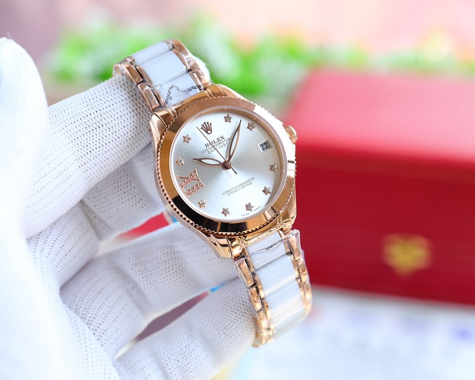 Brand：Rolex Style：New Women's Mechanical Watch Movement：Imported Citizen 8215 Mechanical Mirror：Imported Sapphire Glass Bracelet：Real Cowhide Bracelet316L Ceramic Bracelet between Steel Size：Diameter 34mm Thickness 11mm 