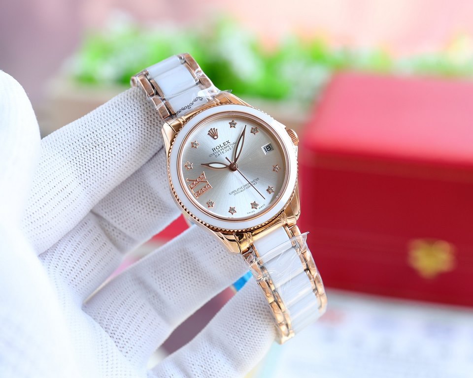 Brand：Rolex Style：New Women's Mechanical Watch Movement：Imported Citizen 8215 Mechanical Mirror：Imported Sapphire Glass Bracelet：Real Cowhide Bracelet316L Ceramic Bracelet between Steel Size：Diameter 34mm Thickness 11mm 