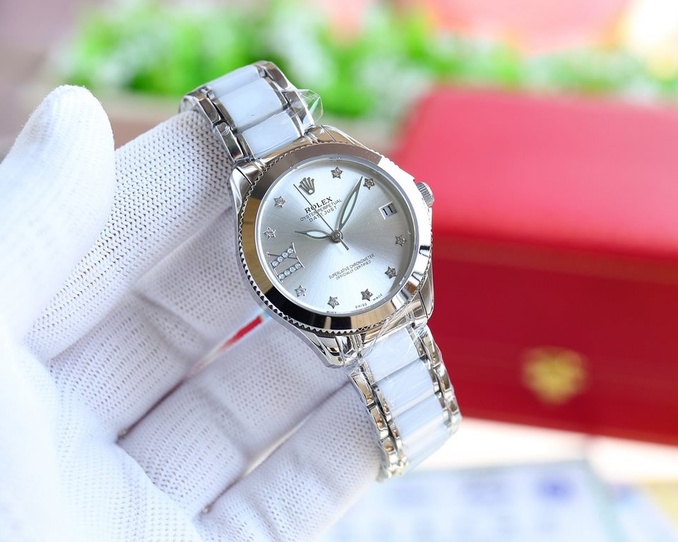 Brand：Rolex Style：New Women's Mechanical Watch Movement：Imported Citizen 8215 Mechanical Mirror：Imported Sapphire Glass Bracelet：Real Cowhide Bracelet316L Ceramic Bracelet between Steel Size：Diameter 34mm Thickness 11mm 