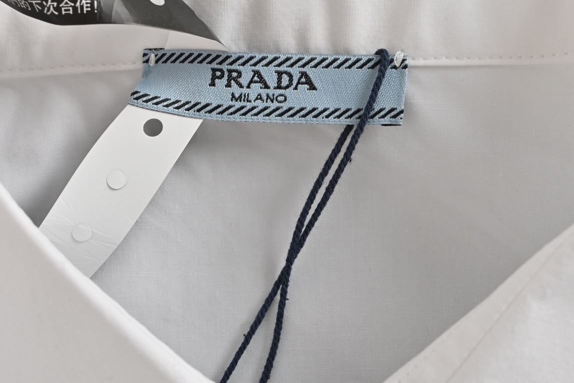 PRADA Prada Triangle Pocket Poplin Long Sleeve ShirtMade of superfine 60 count organic cotton high density poplin fabric (BCI Swiss certified), collarkevlarplacket with 75D knitted viscose lining, customized iconic silve