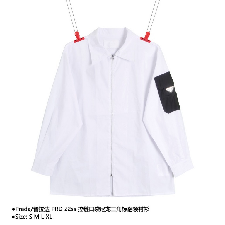 PradaPrada PRD 22ss Zipper Pocket Nylon Triangle Label Collar ShirtSize：S M L XLThe fabric is made of woven 100% combed cotton, which is comfortable and breathable and not easy to pill. The pocket patch is made of Prd's 