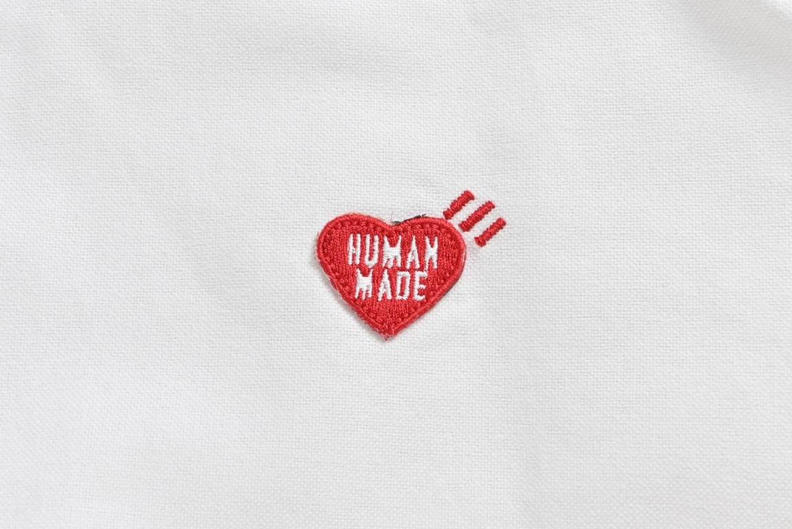 Human Made Heart Embroidered Oxford Long Sleeve ShirtThis shirt features a heart embroidered on the chest in bold red thread and the slogan Gears For Futuristic Teenagers embroidered in the same color directly below. Tai