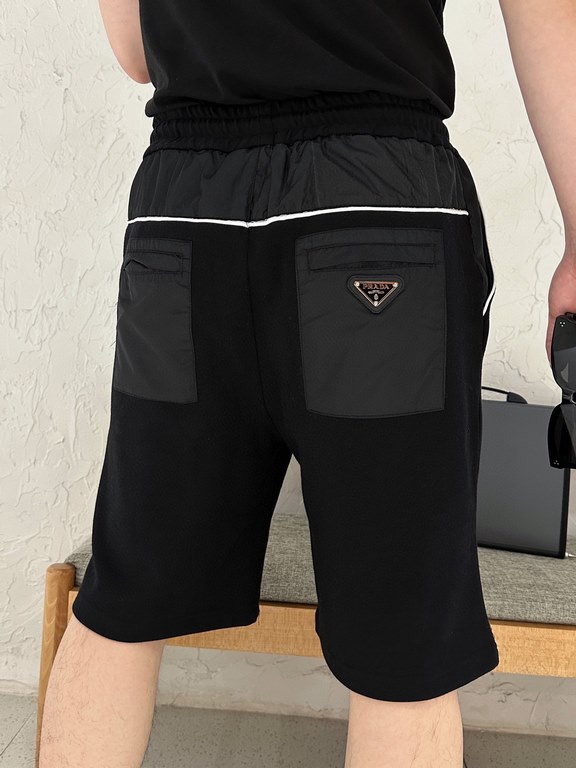 #PRADAPrada Triangle Label Spliced Athletic Shorts On