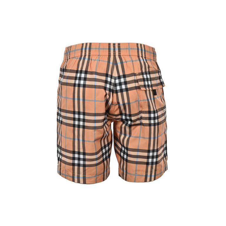 BurberryBurberry striped plaid beach shortsSummer channel limited beach shorts, custom striped fabric as the finishing touch of the entire pants, more personality senior, loose wide leg pants version, on the body in seco