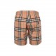 BurberryBurberry striped plaid beach shortsSummer channel limited beach shorts, custom striped fabric as the finishing touch of the entire pants, more personality senior, loose wide leg pants version, on the body in seco