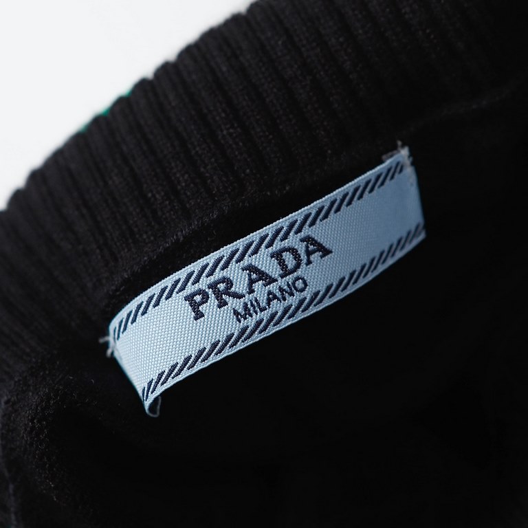 P260 PRADA22SS New Bottom Sweater for Men and Women  From the FallWinter 2022 runway collection, this faux modal wool penguin collar sweater. The body decoration is inspired by science fiction movies. The jacquard neckli