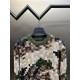 450 Lv Camo Mosaic Studded Embroidered Knit SweaterMade from 100% wool, this jacquard knit, wool-blend fabric is designed with a camouflage mosaic pattern on the body, the brand's English logo embroidered on the chest, t