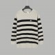 P230CELINE Celine Arc de Triomphe Embroidered Striped Plunger Sleeve SweaterOff-the-shoulder design with raglan sleevesClassic Arc de Triomphe embroideryGray and black color blockingSize XS S M L Original fabric 75% wool