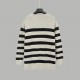 P230CELINE Celine Arc de Triomphe Embroidered Striped Plunger Sleeve SweaterOff-the-shoulder design with raglan sleevesClassic Arc de Triomphe embroideryGray and black color blockingSize XS S M L Original fabric 75% wool