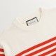 P220 Product DetailsTraditional motifs are reinterpreted through the Gucci aesthetic in a series of classic knitwear pieces. Crafted from jersey cotton, this sweater is brightened with red and ivory stripes. A Gucci appl