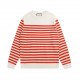 P220 Product DetailsTraditional motifs are reinterpreted through the Gucci aesthetic in a series of classic knitwear pieces. Crafted from jersey cotton, this sweater is brightened with red and ivory stripes. A Gucci appl