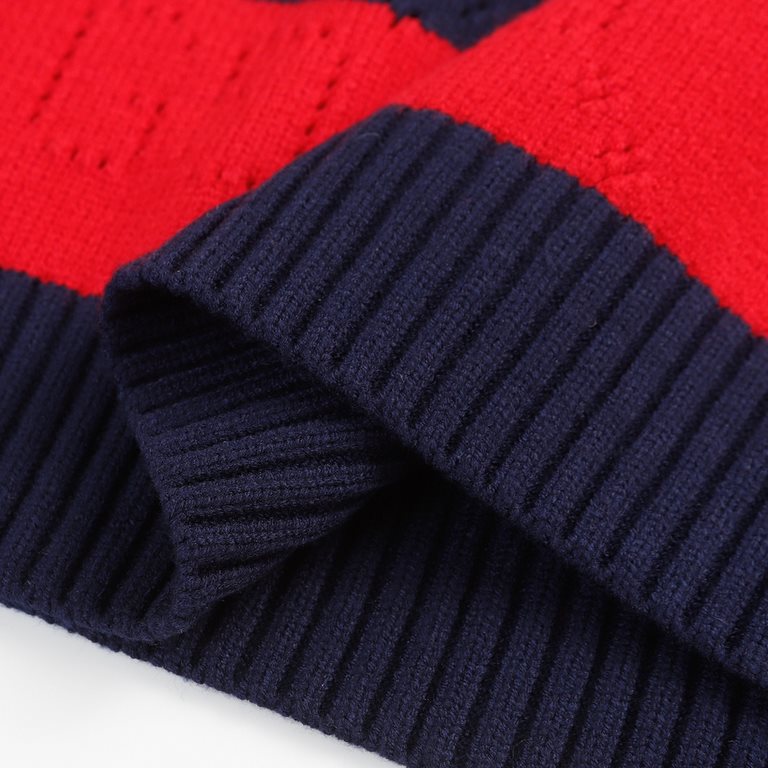 P220 Product Details.The iconic GG motif is subtly rendered in a lace finish in the same hue on this blue and red cotton-jersey jumper, paying homage to the label's founder, Mr. Guccio Gucci. The monogrammed interlocking