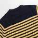 P220 Traditional motifs are reinterpreted through the Gucci aesthetic in a series of classic knitwear pieces. This sweater is crafted from jersey cotton and features bright blue and yellow stripes. The back is embellishe