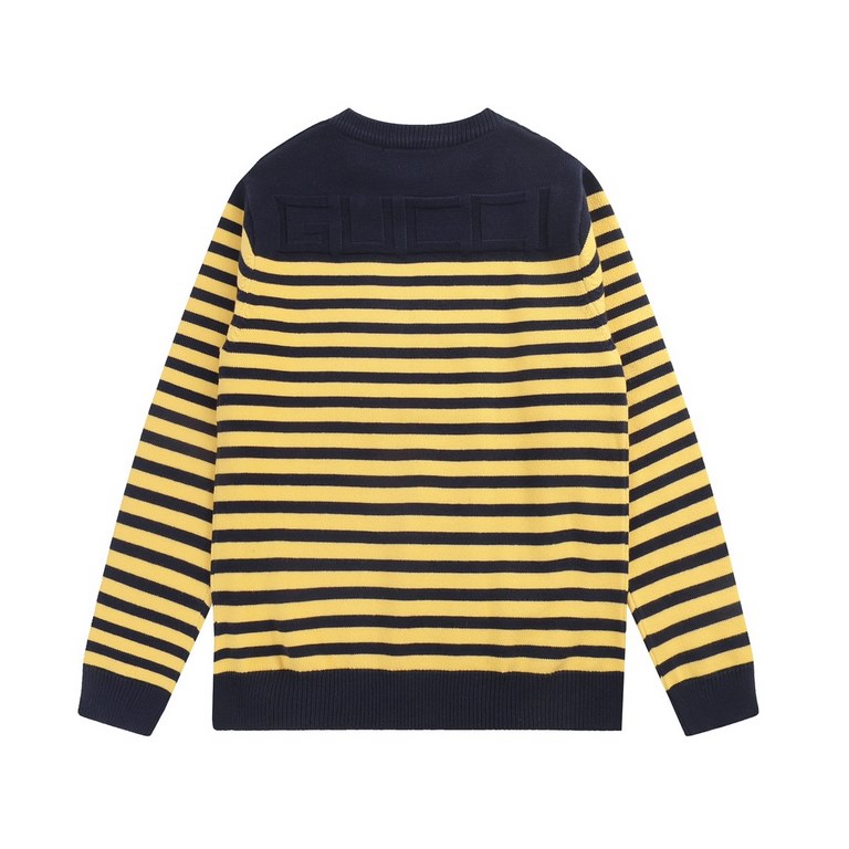 P220 Traditional motifs are reinterpreted through the Gucci aesthetic in a series of classic knitwear pieces. This sweater is crafted from jersey cotton and features bright blue and yellow stripes. The back is embellishe