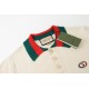 Gucci 2024SS New Chest Double G Knit Lapel Short Sleeve Polo ShirtIvory cotton jersey, red and blue appliqués, interlocking double G embroidered appliqués, webbed lapel, button front, dolman sleeves, ribbed edgingIvory, 