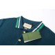 Gucci Gucci 2024FW FallWinter Wool Knit Cotton Blend Polo ShirtNavy blue cotton and wool knit blend, double G embroidery, gold tone buttons, polo collar, dolman sleeves, patch pockets, striped ribbed piping, button plack