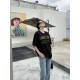 Gucci Gucci Logo Oversized Stylized Embroidered Short Sleeve T-Shirt with Interlocking Buttons-Model's Image