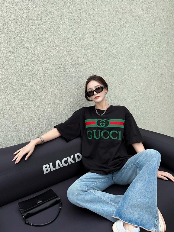 Gucci Gucci Logo Oversized Stylized Embroidered Short Sleeve T-Shirt with Interlocking Buttons-Model's Image