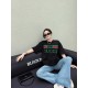 Gucci Gucci Logo Oversized Stylized Embroidered Short Sleeve T-Shirt with Interlocking Buttons-Model's Image