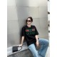 Gucci Gucci Logo Oversized Stylized Embroidered Short Sleeve T-Shirt with Interlocking Buttons-Model's Image