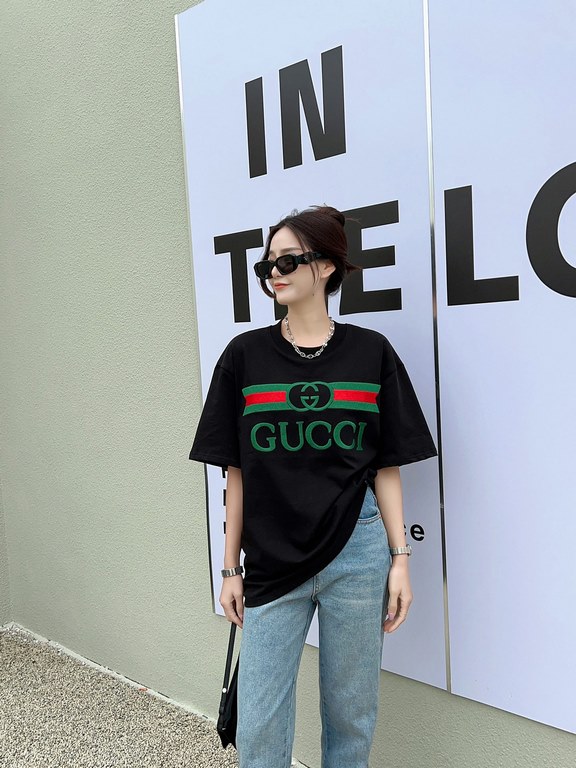 Gucci Gucci Logo Oversized Stylized Embroidered Short Sleeve T-Shirt with Interlocking Buttons-Model's Image