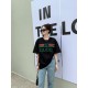 Gucci Gucci Logo Oversized Stylized Embroidered Short Sleeve T-Shirt with Interlocking Buttons-Model's Image